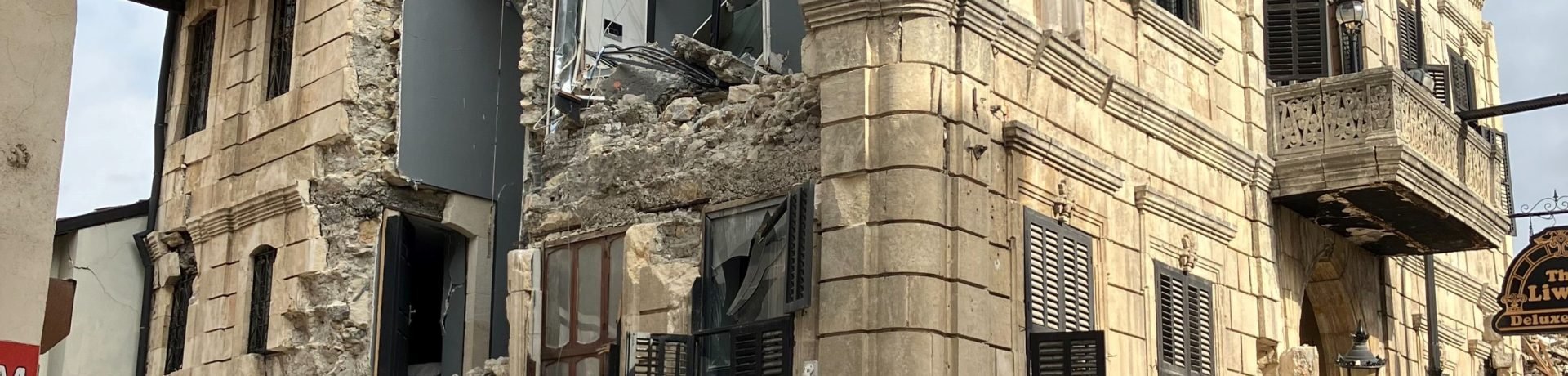 Street in Antakya, Turkey with historical building damaged by earthquake
